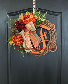 Large Fall hydrangeas, foliage and a double bow combined with a festive rustic pumpkin, this wreath is perfect to decorate, and for celebrating,