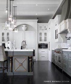 White Upper Cabinets and Gray Lower Cabinets with Gray Kitchen Island