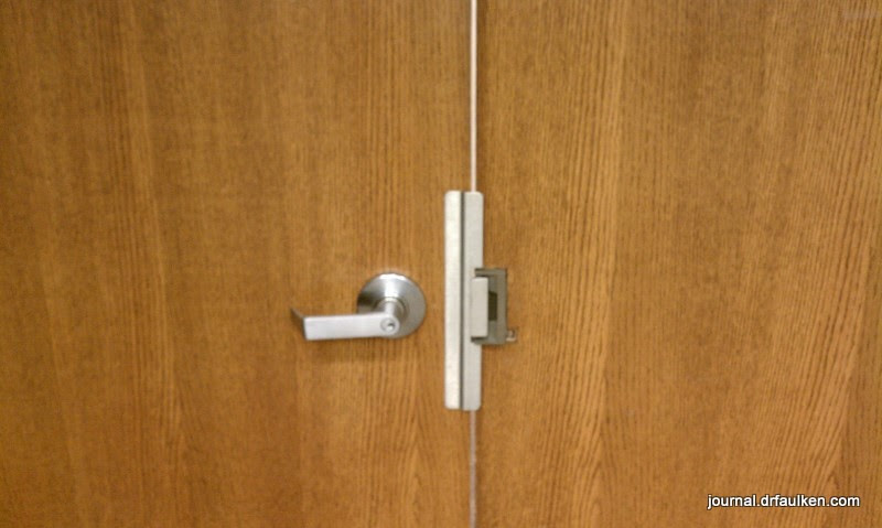 inward opening door with inward opening pull handle