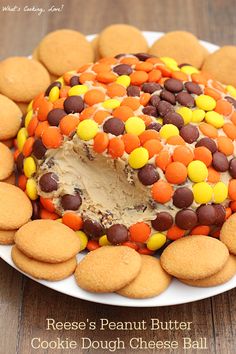 Reese&#39;s Peanut Butter Cookie Dough Cheese Ball. A delicious dessert appetizer that tastes like peanut butter cookie dough and is loaded with Reese&#39;s Peanut Butter Cups and covered in Reese&#39;s Pieces.