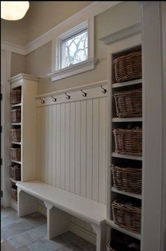 Simple built-ins to create a mudroom or storage anywhere from a kids room to a laundry room by adding shelves or a deeper bench for sitting. Or instead of custom, buy two thrify store bookcases and paint them, bolt them to your wall and add wainscotting between them. Then pick up a thift store bench and cut it to fit. Add the hooks and you're set. - <a href="http://interiors-designed.com" rel="nofollow" target="_blank">interiors-designe...</a>