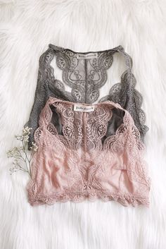 - Details - Size - Shipping - ??? 95% Nylon 5% Spandex ??? Lace triangle bralette with hook and eye closure tank ??? Hand Wash ??? Line dry ??? Imported ??? Runs small ??? Model is wearing M/L ??? S/M will fit A cup