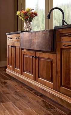 love this rustic sink, I wonder if I could redo my cabinets like these?