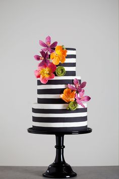 This striped wedding cake is absolutely stunning. #watters #cake www.pinterest.com/wattersdesigns/