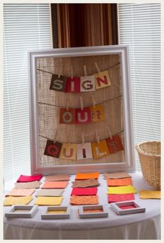 Adorable guest book idea- a Guest book quilt made from squares of fabric your guests sign.