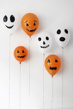 Dress up regular balloons with Sharpies for Halloween.