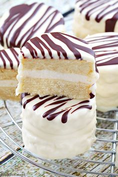 Infused with vanilla flavor and coated in white chocolate with dark chocolate stripes, these made from scratch copycat zebra cakes are dangerously good!