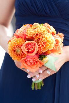 Orange dahlia and rose bouquet... i love these colors for a fall wedding
