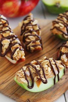 Chocolate-Peanut Butter Granola Apple Bites - Very delicious and easy to make. You can substitute the granola for crushed graham crackers.