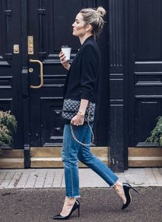black blazer, jeans, black heels, top knot