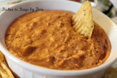 Bean Dip 16 oz. can of refried beans 1 Cup of Salsa (I always use Picante) 2 Cups of Cheddar Cheese (I prefer Sharp but will use whatever is on hand) 1 Cups of Sour Cream 3 oz. package of Cream Cheese 1 T. Chili Powder Throw it in the crock pot and put it on high or low depending on how much time you have. Stir it every once in a while until it is all melted together. Enjoy with chips.