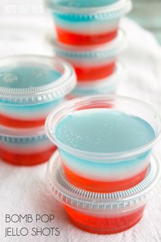 Turn one of your favorite popsicles into Bomb Pop Jello Shots! They're perfect for Memorial Day or 4th of July parties! | Bread Booze Bacon