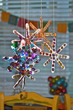 Popsicle Snowflakes. Could use less &quot;girly&quot; stuff like small pebbles, marbles, leaves, etc for Cub Scouts.