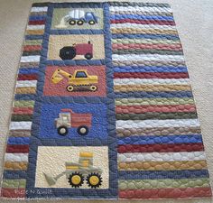 This is an adorable little boy quilt, but I also love the layout as well. You could applique the truck blocks with almost anything to suit the person who would be getting the quilt. Also the layout makes it easy to resize.