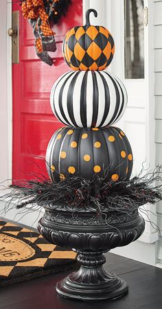 Put a designer spin on decorating with gourds. Our Halloween Stacked Pumpkins are both witty and stylish.