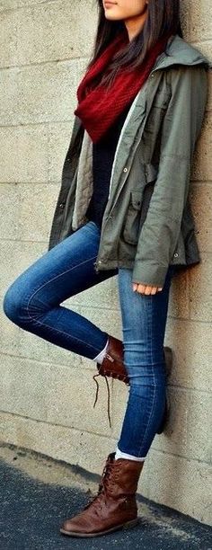 Brown leather boots, skinny jeans, burgundy scarf, olive utility jacket, black t-shirt.