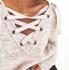 Lace up sweater.