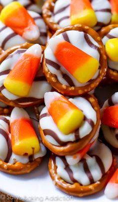 An easy 20 minute Fall treat! These candy corn pretzel hugs are festive, fun, sweet, and salty.