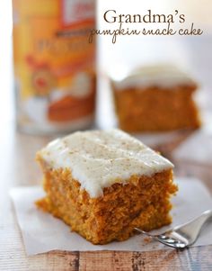This Pumpkin Snack Cake is packed full of fall flavors, and topped with a easy cream cheese cinnamon-dusted frosting! | Kitchen Meets Girl