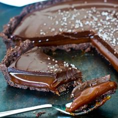 Chocolate Salted Caramel Tart - A buttery almond crust, gooey salted caramel and chocolate ganache, garnished with salt.