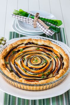 Not only is this Italian Spiral Vegetable Ricotta Pie super impressive looking, it tastes amazing too! <a class="pintag searchlink" data-query="%23easterrecipes" data-type="hashtag" href="/search/?q=%23easterrecipes&rs=hashtag" rel="nofollow" title="#easterrecipes search Pinterest">#easterrecipes</a> <a class="pintag searchlink" data-query="%23vegetarianrecipes" data-type="hashtag" href="/search/?q=%23vegetarianrecipes&rs=hashtag" rel="nofollow" title="#vegetarianrecipes search Pinterest">#vegetarianrecipes</a> <a class="pintag searchlink" data-query="%23meatlessentrees" data-type="hashtag" href="/search/?q=%23meatlessentrees&rs=hashtag" rel="nofollow" title="#meatlessentrees search Pinterest">#meatlessentrees</a>