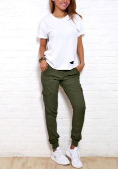 Lookbook Store // Look cool and stylish with this pair of rifle green cargo joggers. It&#39;s non-stretchable, has mid-rise waist with drawstrings and leg pockets for that true cargo style.