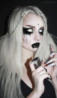 Ghost Make Up - Get the white out contacts. Easier to get the ones where you still see your pupil but still very creepy.