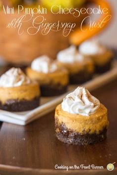 Mini Pumpkin Cheesecakes with a Gingersnap Crust. The best fall dessert that looks so pretty and tastes amazing!