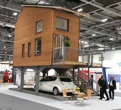 Architect Bill Dunster has designed a range of tiny flats that stand on stilts above car parks in a bid to solve the UK&#39;s housing crisis (above)