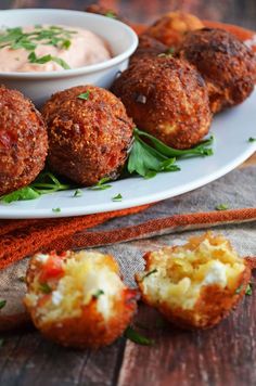 Cheesy Crab Poppers...cornbread brings out the sweetness of the crab and the addition of the bell peppers and cheese gives it all a great balance of flavors. Add chopped jalapeno for a kick of spice and serve with favorite prepared remoulade sauce