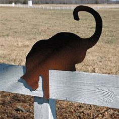 $54.95- Our sly silhouetted Fence Cat looks great on your garden wall, daring on your deck and purrrrfect on your patio! Give this fancy feline a home in your yard or as a great gift!