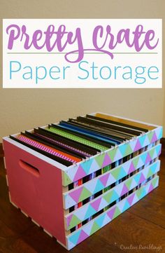 Turn a simple wood crate into 8.5 x 11 scrapbook paper storage using hanging files and a little paint.