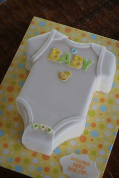 Onesie shaped baby shower cake