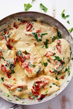 Creamy Tuscan Garlic Chicken has the most amazing creamy garlic sauce with spinach and sun dried tomatoes. This meal is a restaurant quality meal ready in 30 minutes! One more week left of school. One. As I look back at this last school year it has flown by! I feel like we were just ???