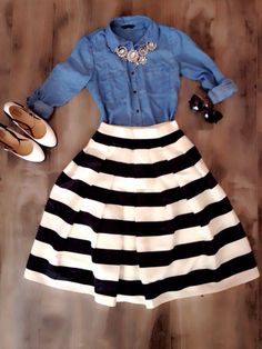 Tuck a denim shirt a a flirty striped full skirt and top off the look with a statement necklace for a chic spring look