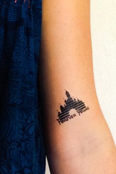 Rep your crib cause you&#39;re never too old for Disney. Two tattoos of Cinderella&#39;s castle with the words Forever Young Easy Application lasting 2-5 days. Measures 1.5 by 2 inches.