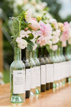 Wine bottle table markers: <a href="http://www.stylemepretty.com/connecticut-weddings/north-stonington/2015/03/27/romantic-jonathan-edwards-winery-sunset-wedding/" rel="nofollow" target="_blank">www.stylemepretty...</a> | Photography: Melani Lust - <a href="http://melanilustphotography.com/" rel="nofollow" target="_blank">melanilustphotogr...</a>