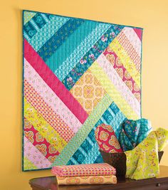 Spin Me Round Wallhanging Quilt - free instructions available to download on website