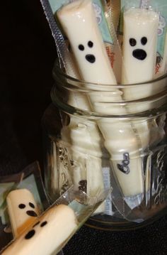 Healthy Halloween Treats - Cheesy Ghost: Nothing can be quicker than this healthy treat. Simply draw a ghost face on a cheese stick with a Sharpie.