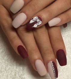 Loving the matte colors on this white and maroon nail art design. Matte always???