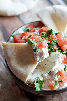 Garlicky Feta Dip. This creamy, tangy dip goes great with pita and is easy to whip together as a party appetizer! | <a href="http://blog.hostthetoast.com" rel="nofollow" target="_blank">blog.hostthetoast...</a>
