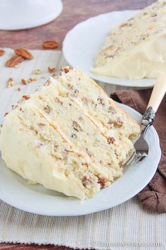 Butter pecan cake! Ingredients 1 1/4 cup butter, softened, divided 2 cups chopped pecans 2 cups sugar 4 eggs 2 tsp vanilla extract 3 cups all purpose flour 2 tsp baking powder 1/2 tsp salt 1 cup milk FROSTING: 2 pkgs (8 oz each) cream cheese, softened 1 cup (2 sticks) butter, softened 1 pkg (2 lbs) confectioners??? sugar 2 tsp vani