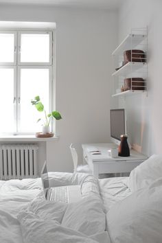 Keep it all in white in the bedroom, when there&#39;s no room for a desk elsewhere