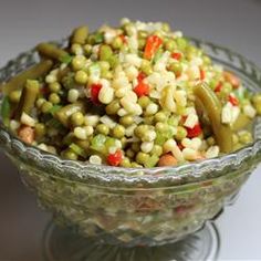 1can peas,1 can corn, 1 can green beans, 1 jar pimentos1 cup chopped celery 1/2 cup chopped green bell pepper 1/2 cup onion 1cup white sugar 1/2 teasp pepper 1teasp salt 1/2 cup oil 3/4 cup white wine vinegar Mix together In a saucepan over medium heat, combine the sugar, black pepper, salt, oil and vinegar. Bring to a boil and pour over salad; mix well to coat. Refrigerate for 24 hours.