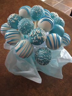 instead of a cake or cupcakes- im thinking these in white and blue. or green and white. in little pots and use them as center pieces.