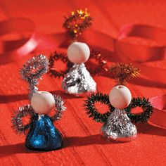 Hershey&#8217;s&#174; Kisses&#174; Angels Craft - instead of the wooden bead tho, I&#39;d use another round candy ball of some sort. But then again, you could draw a little face on the wood. hmmm... Consider using a gumball, perhaps. You could even use an edible ink pen to draw on a face.